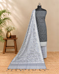 Black silk cotton chudi set with silver accents, showcasing traditional Indian jewelry in a stylish, elegant design.
