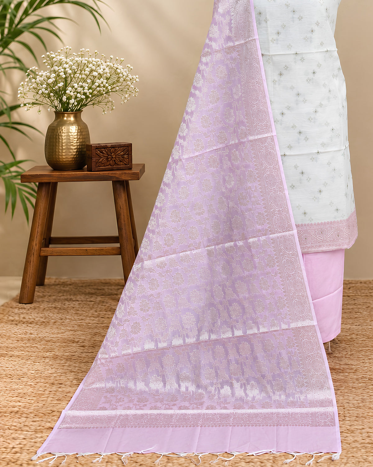 Off-white and pastel pink silk cotton fabric by S Fabs, showing soft, smooth material ideal for elegant clothing or textile projects.