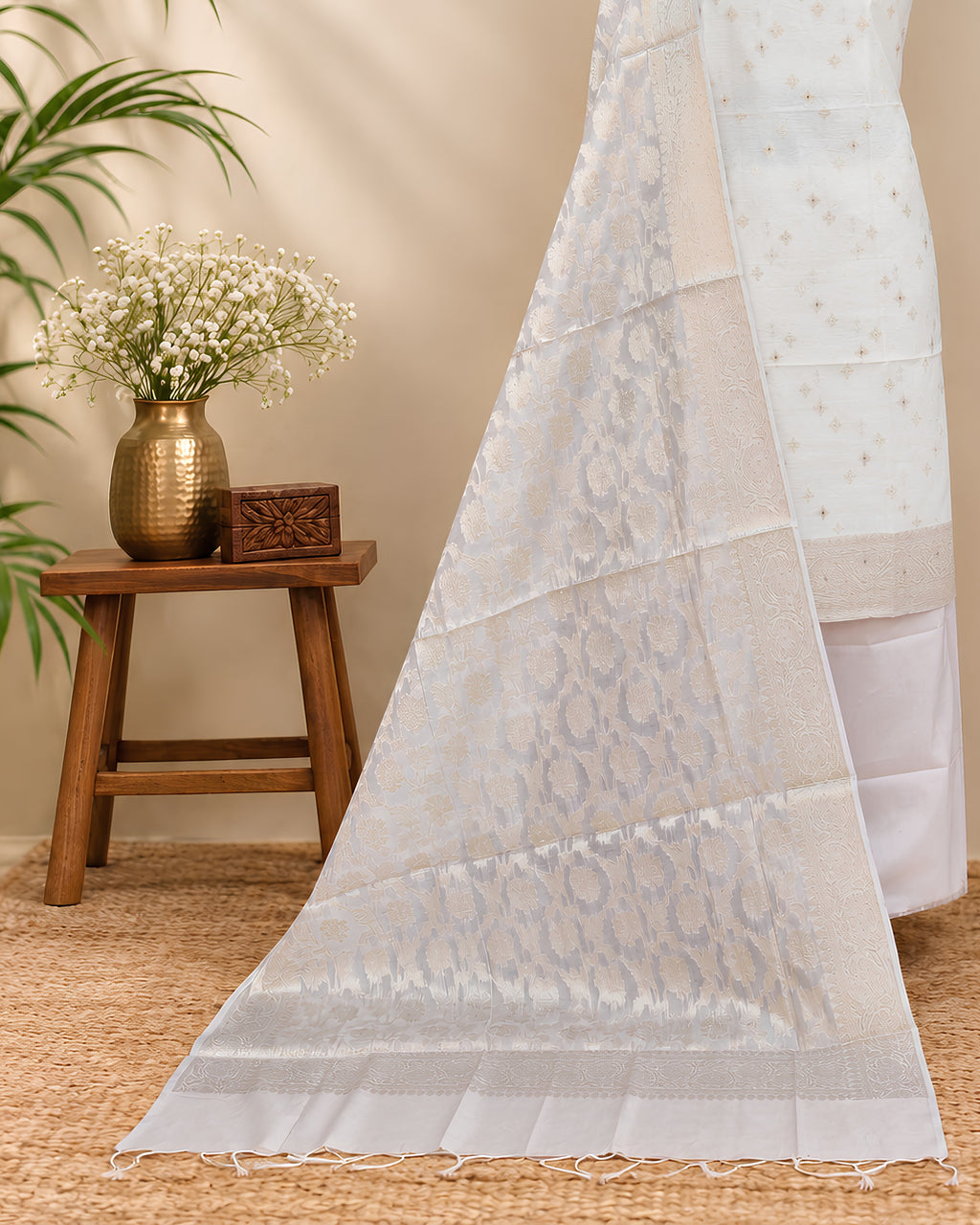 Off-white solid beige silk cotton fabric from S Fabs, showcasing smooth, soft material with a subtle pastel tone.