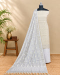 Soft beige and off-white Chanderi Zari weave chudi set material from S Fabs, showcasing intricate fabric details and elegant texture.