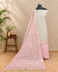 Soft beige and pastel pink Chanderi Zari weave chudi set fabric by S Fabs, showcasing intricate traditional material design.