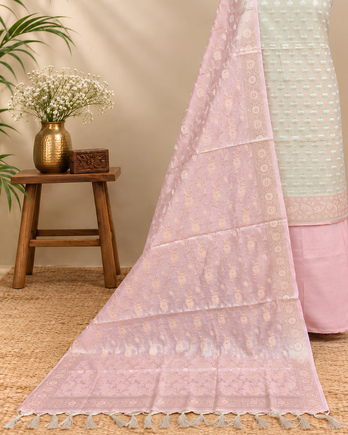 Soft beige and pastel pink Chanderi Zari weave chudi set showcasing intricate craftsmanship and elegant fabric from S Fabs.