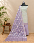Soft off-white and dusty lavender Kota Zari Weave Chudi Set made with intricate material from S Fabs.