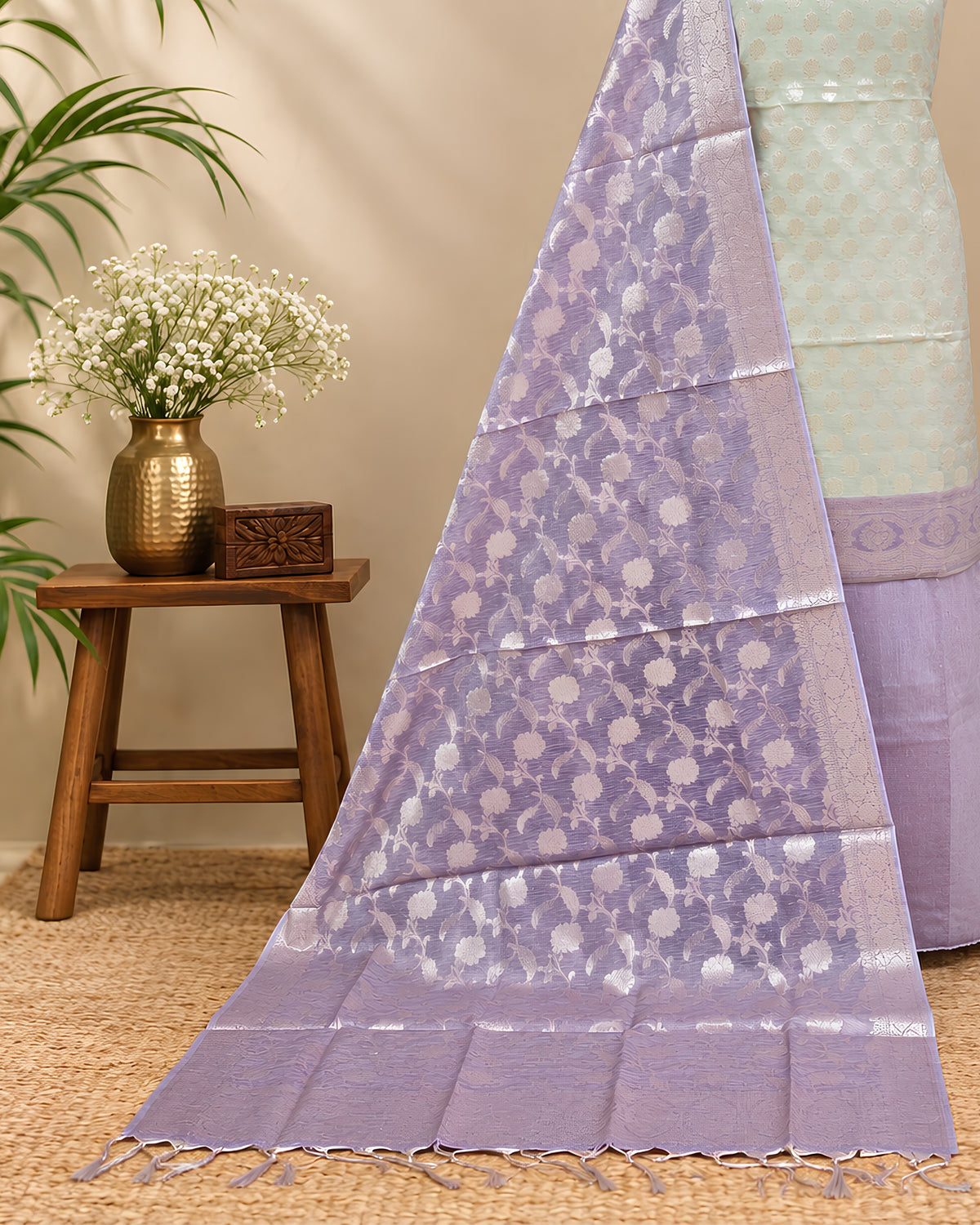 Off-white and dusty lavender Kota Zari weave chudi set by S Fabs, showcasing intricate textile details and elegant color blend.
