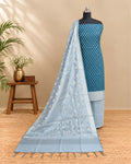 Silk cotton chudi set in teal blue and silver from S Fabs, showcasing the vibrant fabric and intricate design details.