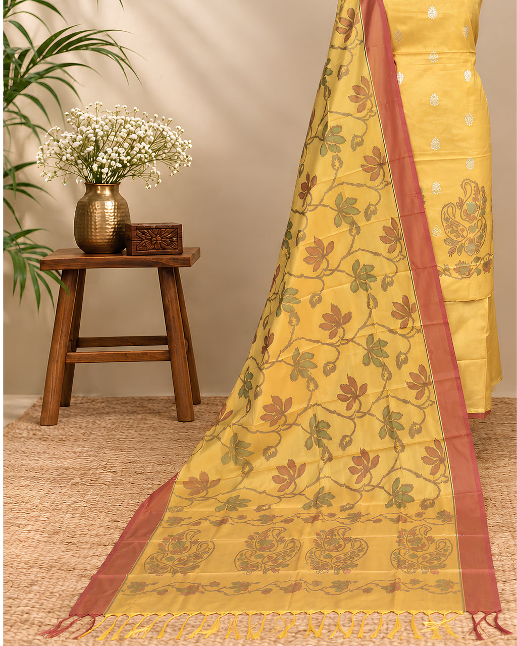 Golden yellow silk Tani print fabric by S Fabs, showcasing smooth, shiny silk material with intricate Tani design details.