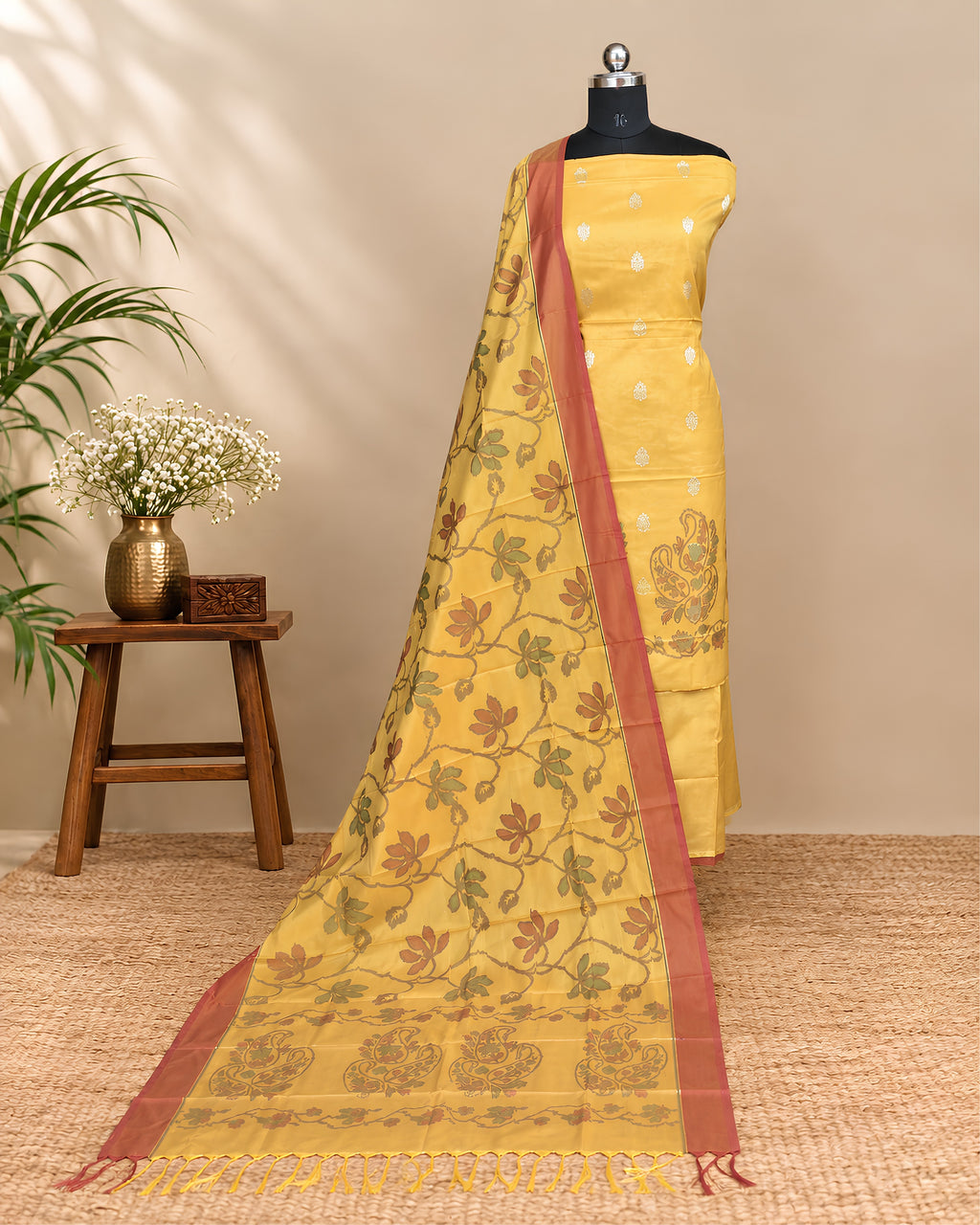 Golden yellow silk Tani print fabric by S Fabs, showcasing vibrant traditional textile with detailed pattern and smooth texture.