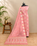 Soft dusty rose Kora Butti Chudi set by S Fabs, featuring intricate traditional jewelry with detailed craftsmanship.