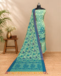 Sage green silk Tani print fabric from S Fabs, showcasing a smooth, luxurious material with intricate design details.