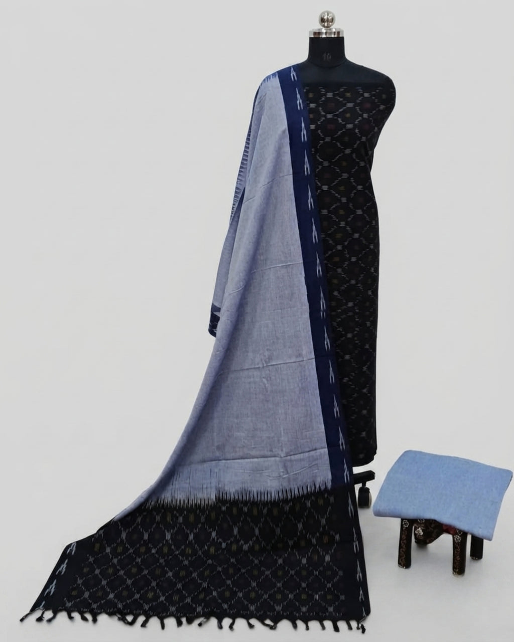Charcoal black, grey, and blue Ikkat Chudi set material by S Fabs, showcasing traditional woven fabric with vibrant colors.