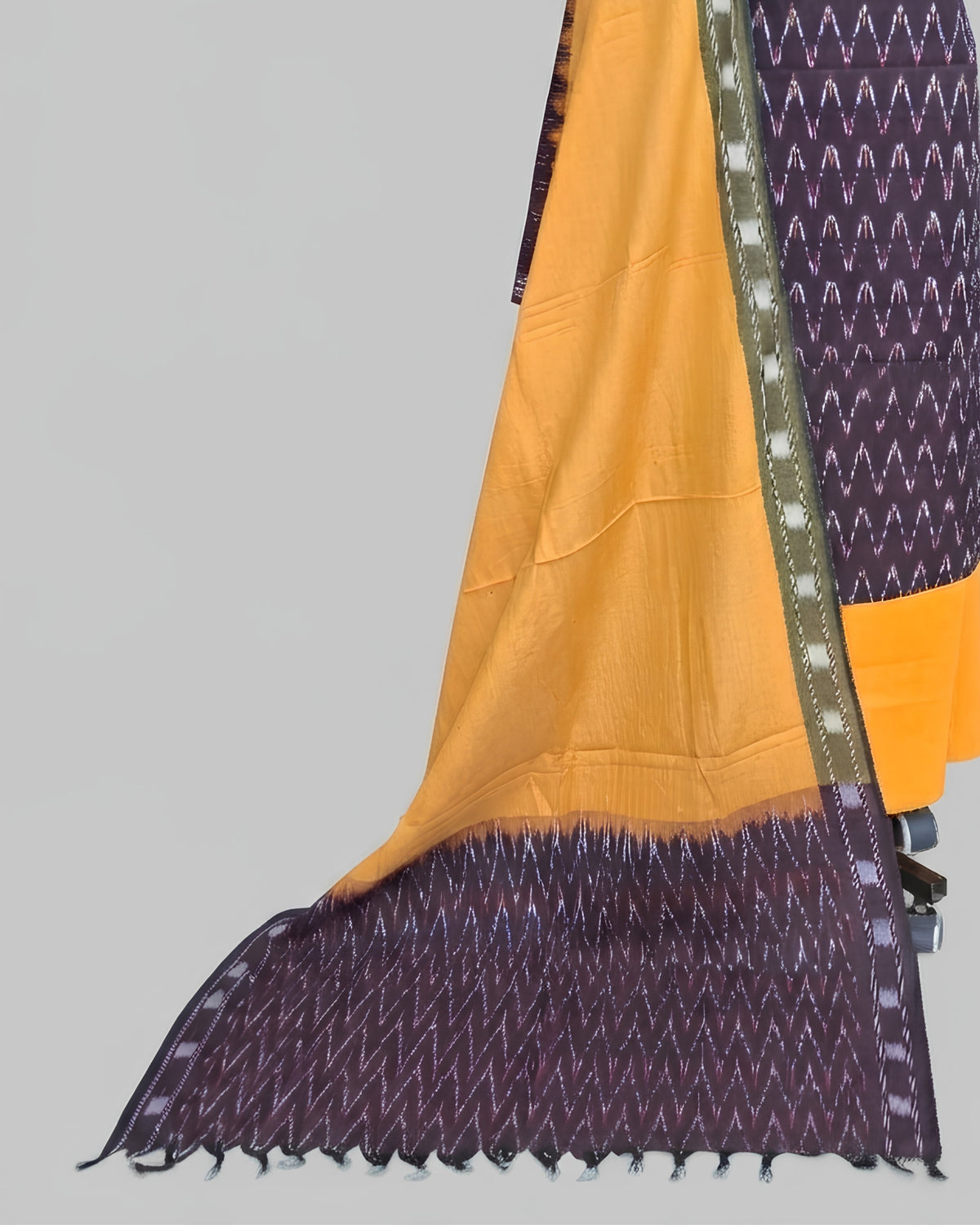 Ikkat Chudi set in deep plum and mustard yellow, featuring intricate woven fabric from S Fabs.