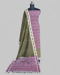 Ikkat chudi set in dusty rose and olive green fabric by S Fabs, showcasing intricate pattern and traditional material.