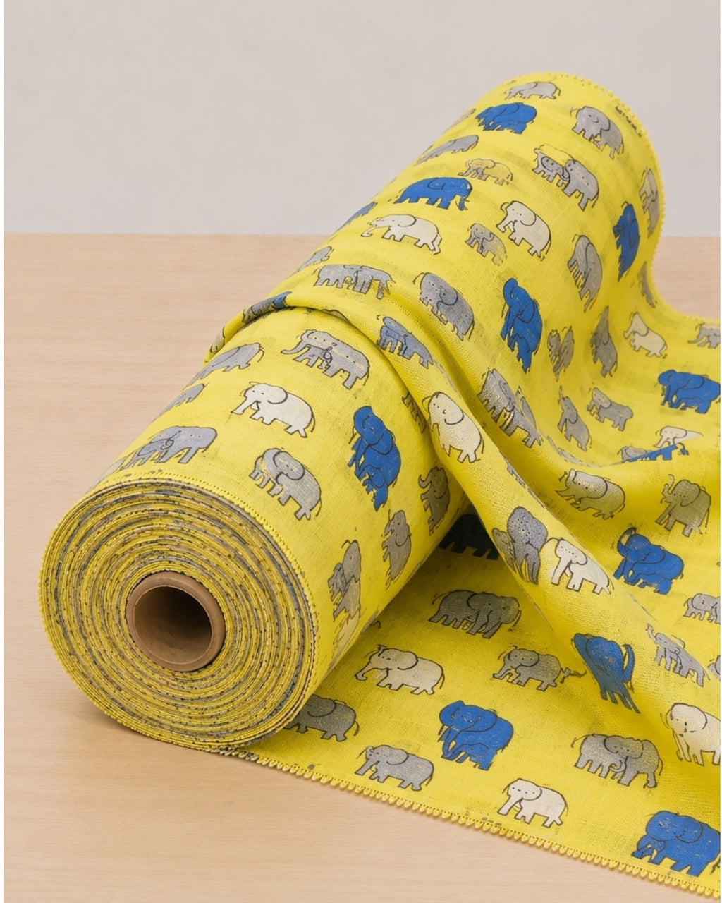 Yellow elephant digital print fabric from S Fabs' Kota material collection, featuring vibrant elephant design on soft textile.