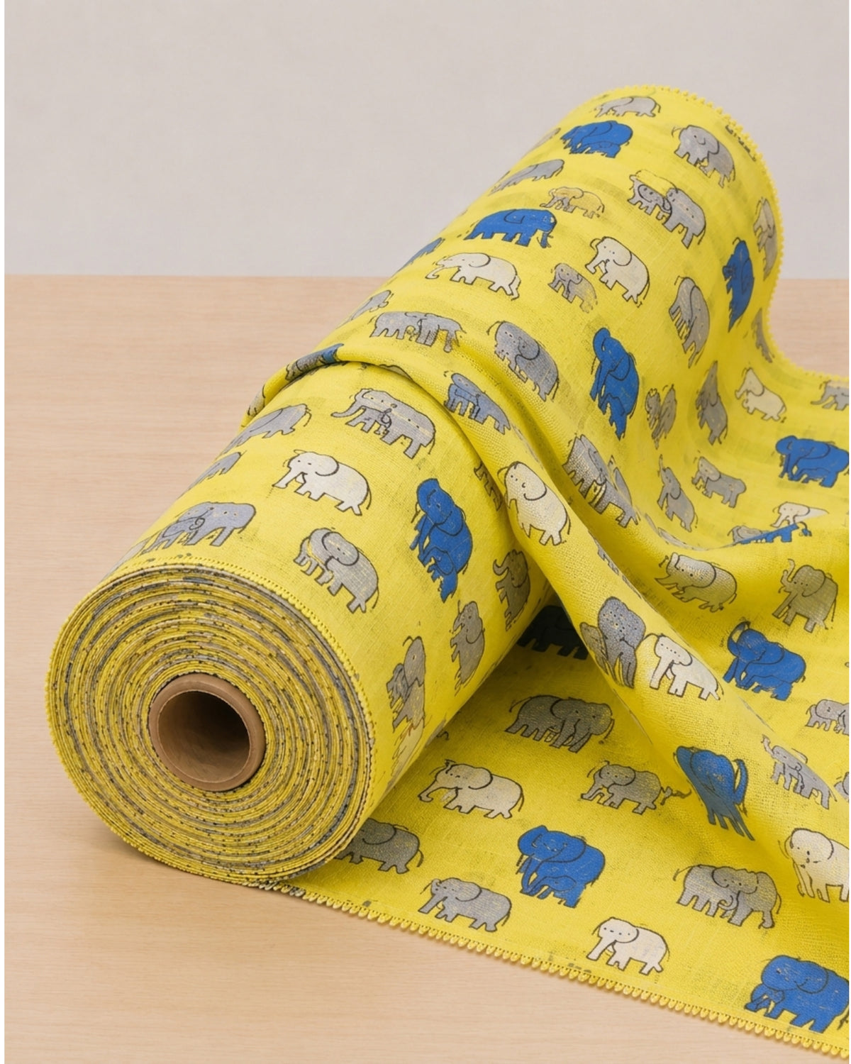 Yellow elephant digital print fabric from S Fabs' Kota material collection, featuring vibrant elephant design on soft textile.