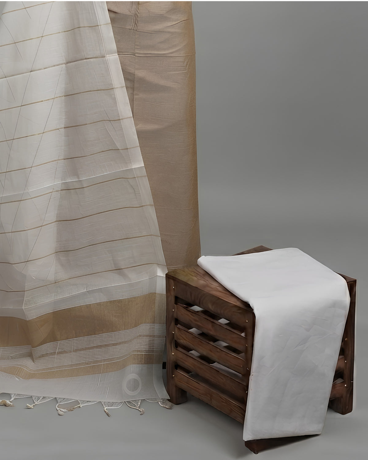 Beige, tan, and white striped cotton fabric by S Fabs, Magalagiri material, showing soft, woven texture and pattern.