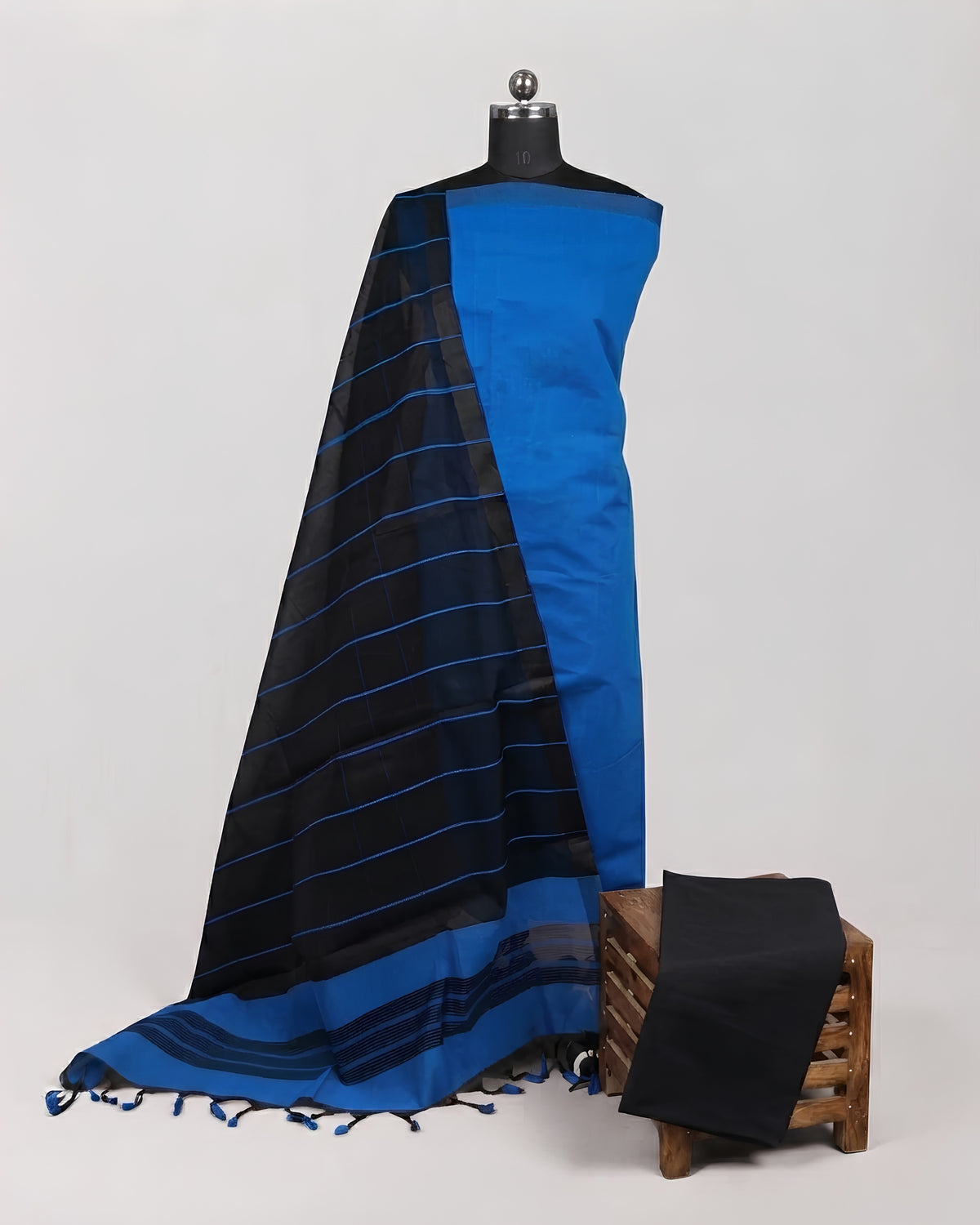 Royal blue and black striped cotton fabric from S Fabs' Magalagiri collection, showcasing soft, high-quality material.