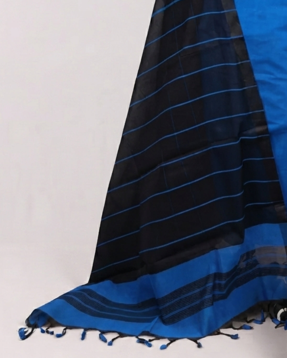 Royal blue and black striped Magalagiri cotton fabric by S Fabs, showing the soft, woven material with vibrant color patterns.