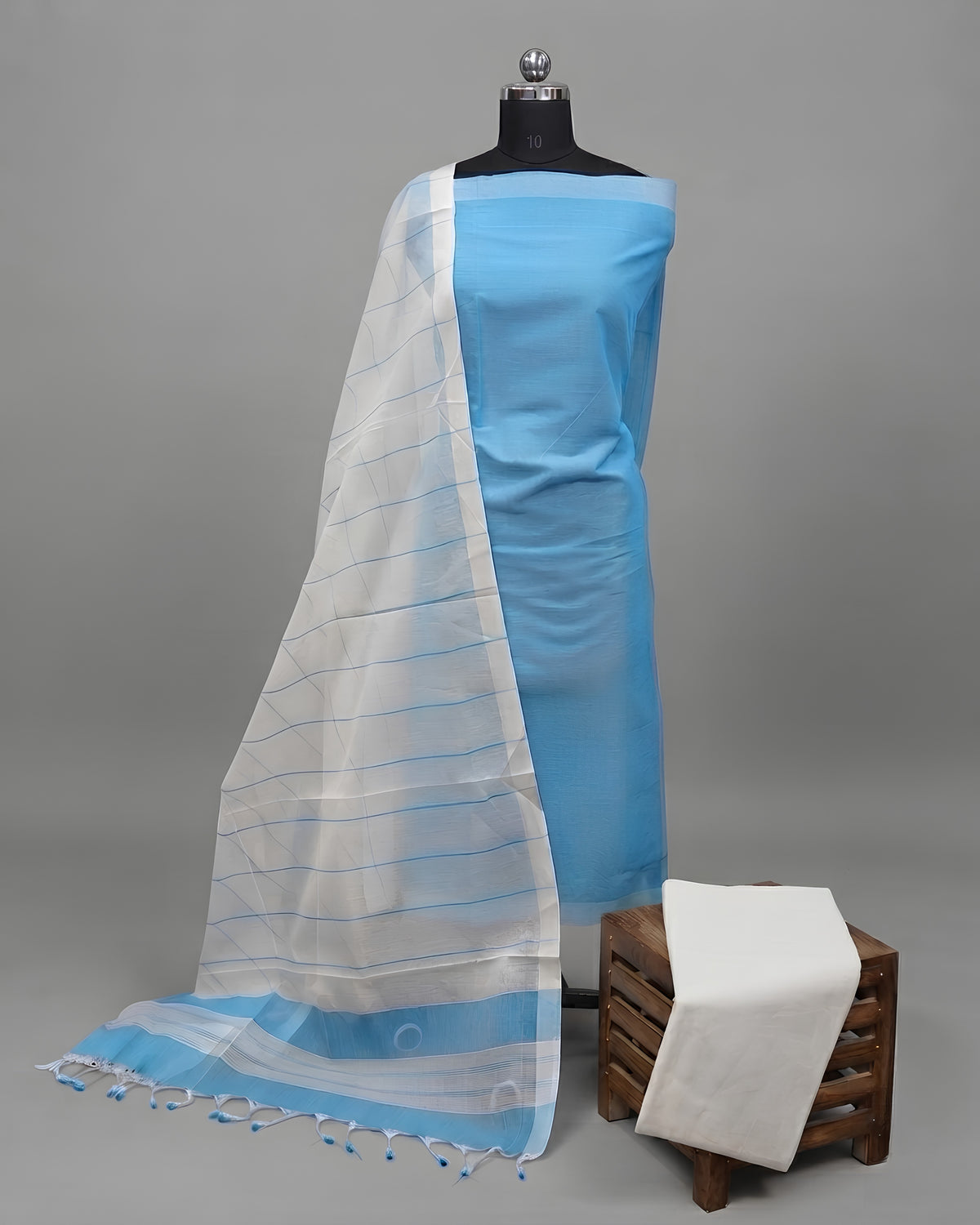 Sky blue and white striped cotton fabric from S Fabs' Magalagiri collection, showcasing soft, breathable material.