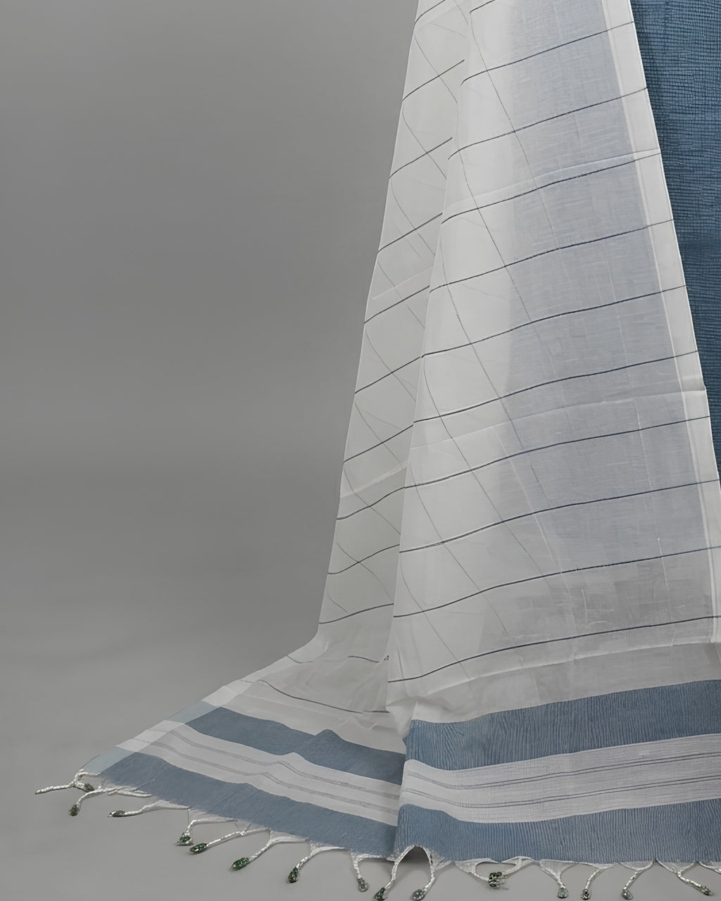 Mangalagiri cotton fabric in slate blue and white, produced by S Fabs, showcasing a soft, traditional textile material.