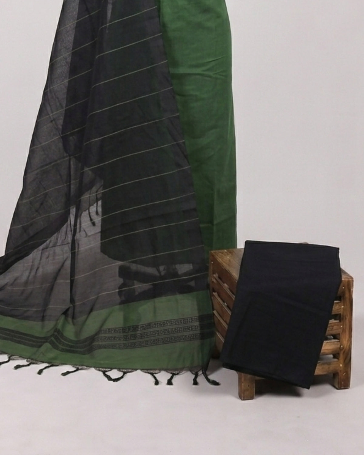 Mangalagiri cotton fabric with green and black stripes from S Fabs, showcasing a soft, woven textile material.