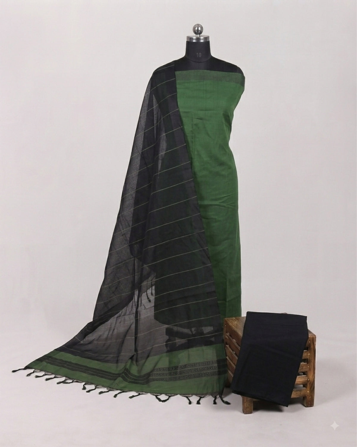 Mangalagiri cotton stripes fabric in bottle green and black by S Fabs, showing the striped pattern and soft texture.