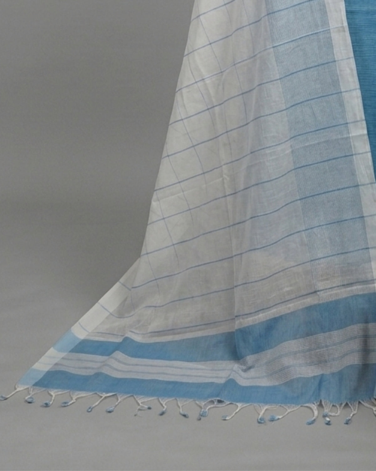 Dark blue and white Mangalagiri cotton stripes fabric by S Fabs, showcasing the traditional woven material with vibrant pattern.