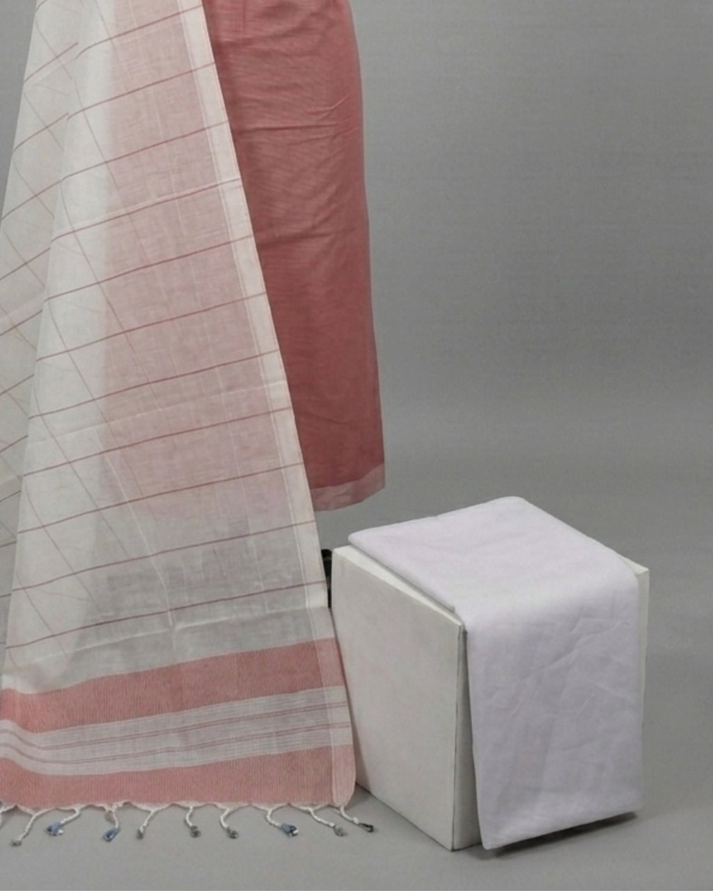 Mangalagiri cotton fabric with dusty rose and white stripes from S Fabs, showcasing soft, woven textile material.