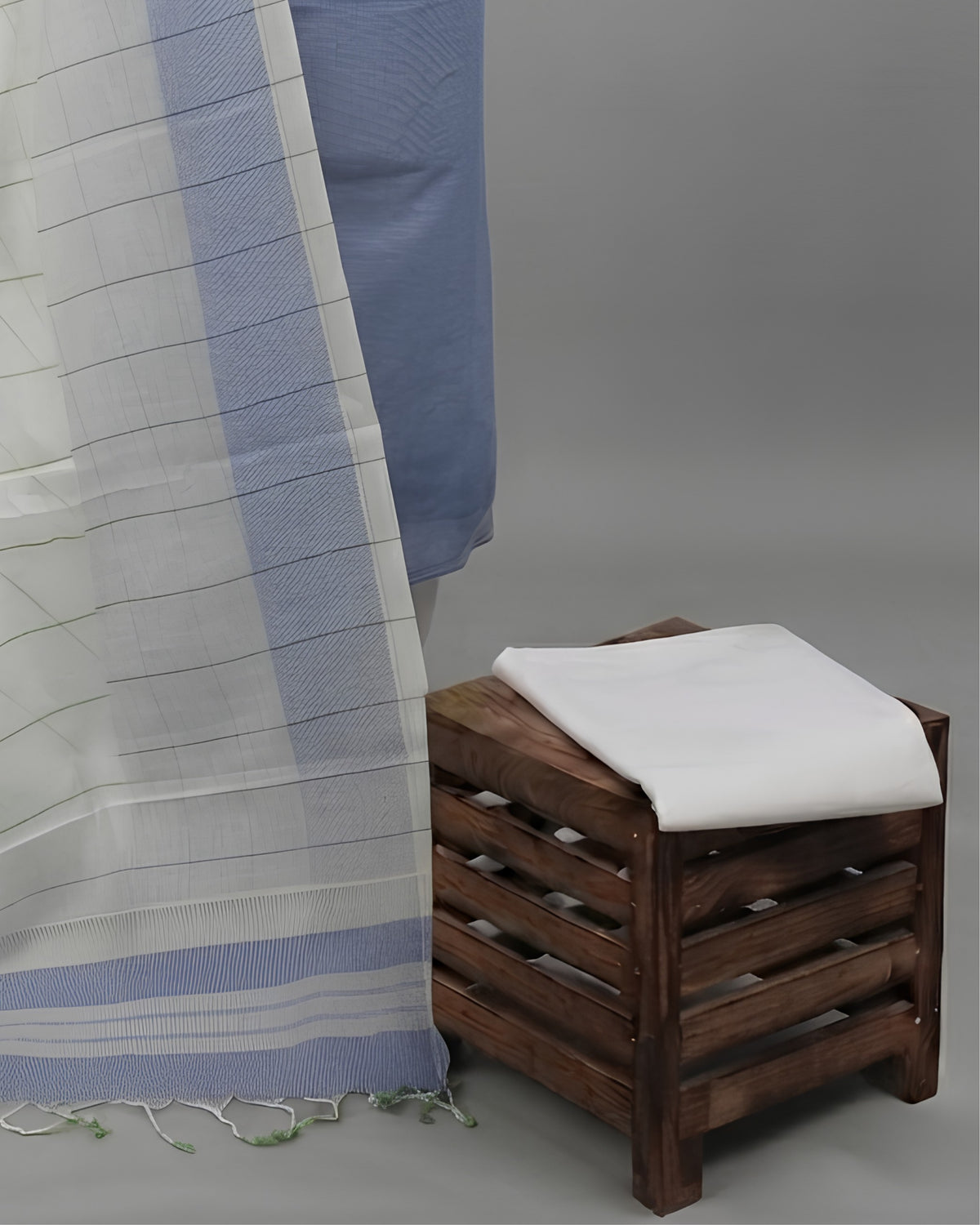 Mangalagiri cotton fabric with muted blue and white stripes, S Fabs material showcasing soft woven textile design.