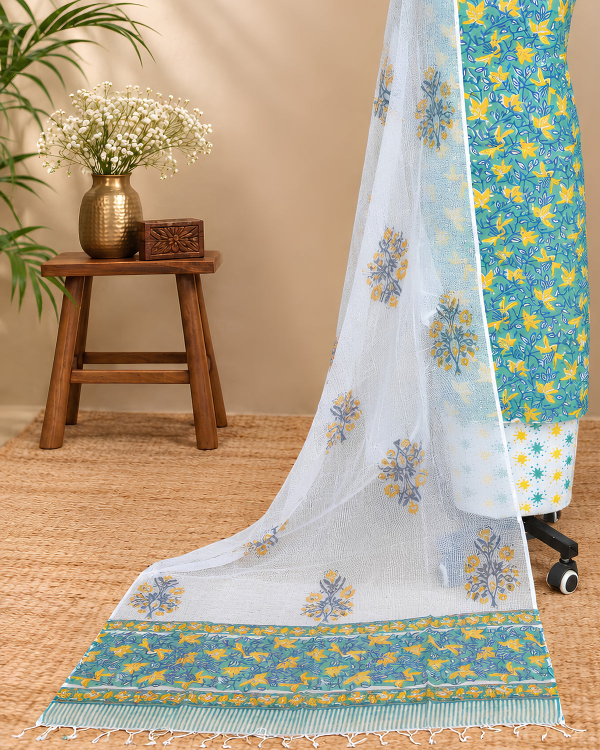 Sea green Mul Mul Kota dupatta with mustard yellow floral pattern, lightweight material from S Fabs.
