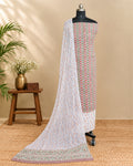 White Mul Mul chiffon dupatta with peach and green floral pattern, showcasing delicate fabric and vibrant floral design.
