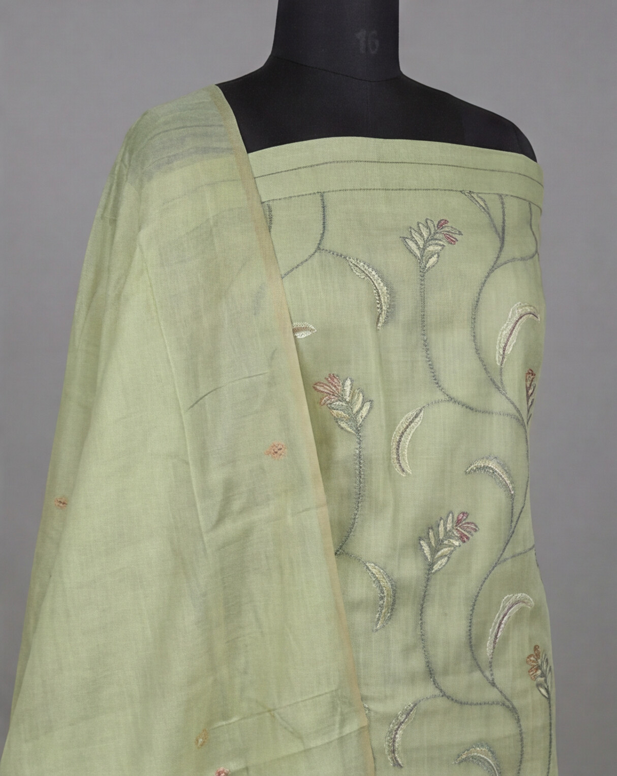 Olive green Premium Chanderi thread from S Fabs, close-up view of the soft, high-quality material for textile use.