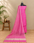 Vibrant pink premium silk butti fabric by S Fabs, showcasing smooth, luxurious silk material with rich color and subtle sheen.
