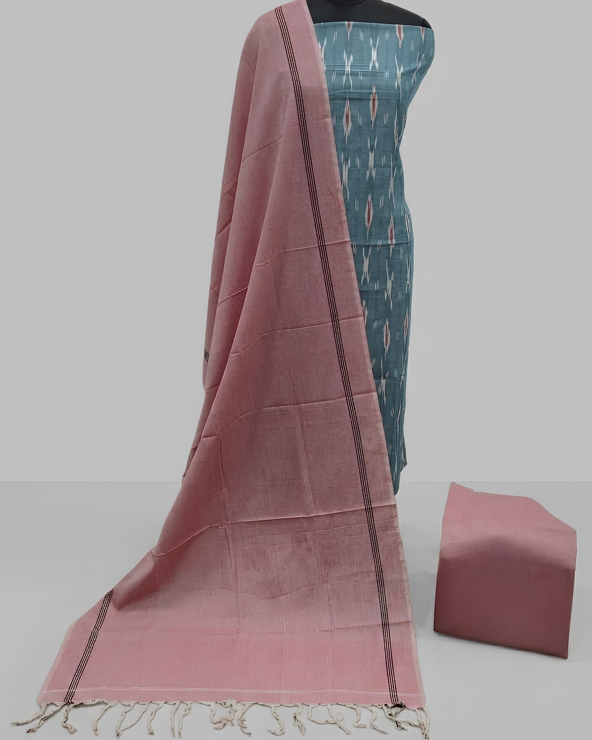 Seafoam blue and dusty rose single Ikkat chudi set by S Fabs, featuring traditional woven fabric with intricate patterns.