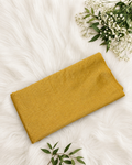 Mustard yellow tissue brocade fabric by S Fabs, showcasing intricate woven pattern and luxurious texture.