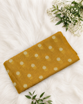 Mustard yellow tissue brocade top by S Fabs showing intricate fabric texture and elegant design.