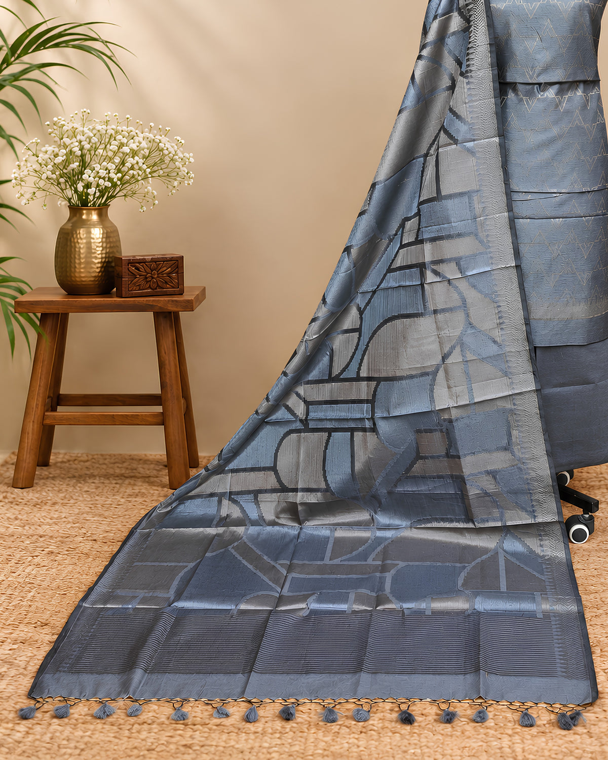 Steel grey Tussar zari Jacquard fabric with geometric pattern by S Fabs, showcasing intricate woven design and textured surface.