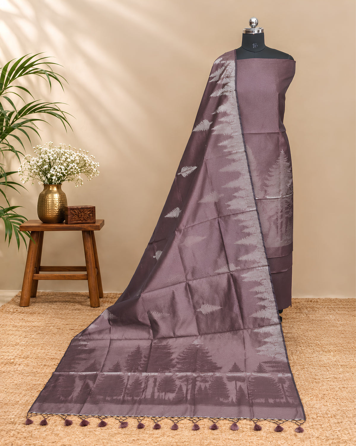 Rich mauve Tussar zari Jacquard fabric with pine tree pattern from S Fabs, showcasing intricate design and luxurious texture.