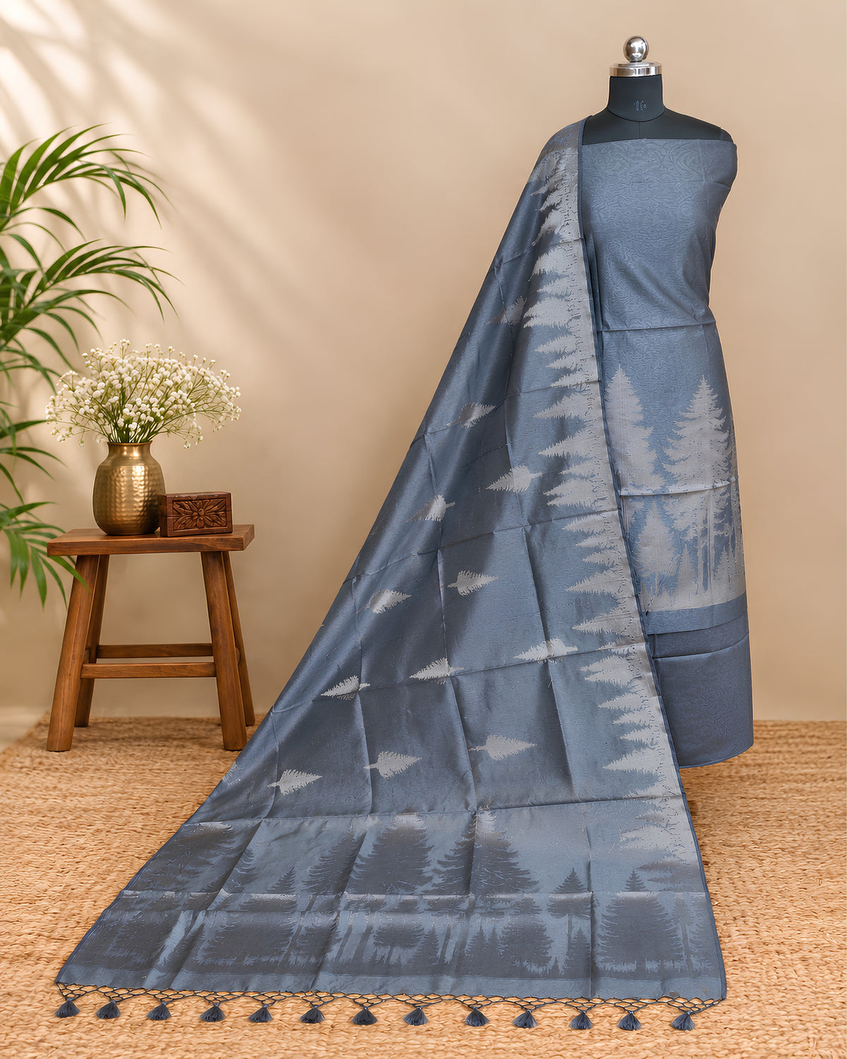 Steel grey Tussar zari Jacquard fabric featuring pine tree pattern from S Fabs, showcasing intricate woven design.